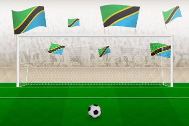 Tanzanya futbol takımının taraftarları stadyumda bayrak sallıyor, futbol maçında penaltı vuruşu kavramı.