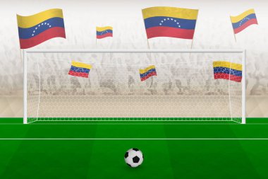 Venezuela futbol takımının taraftarları stadyumda bayrak sallıyor, futbol maçında penaltı vuruşu konsepti.