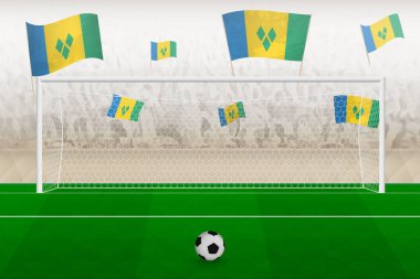 Saint Vincent ve Grenadines futbol takımının taraftarları, Saint Vincent ve Grenadines 'in bayraklarıyla stadyumda tezahürat yapıyor..