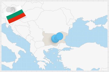 Map of Bulgaria with a pinned blue pin. Pinned flag of Bulgaria.