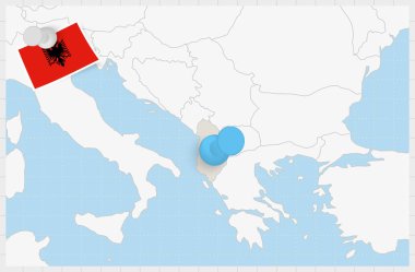 Map of Albania with a pinned blue pin. Pinned flag of Albania.