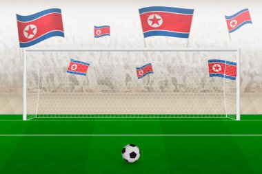 North Korea football team fans with flags of North Korea cheering on stadium, penalty kick concept in a soccer match.
