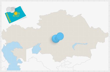Map of Kazakhstan with a pinned blue pin. Pinned flag of Kazakhstan.