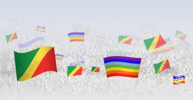 İnsanlar Kongo bayrakları ve barış bayrakları sallıyor. Kongo bayrağı ve barış bayrağıyla kalabalığın kutlama ya da protesto gösterileri. 