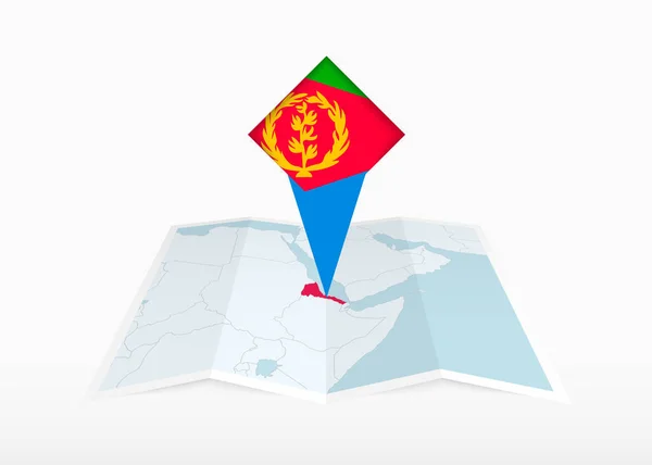 Эритрея Изображена Сложенной Бумажной Карте Приколотой Метке Местоположения Флагом Эритреи — стоковый вектор