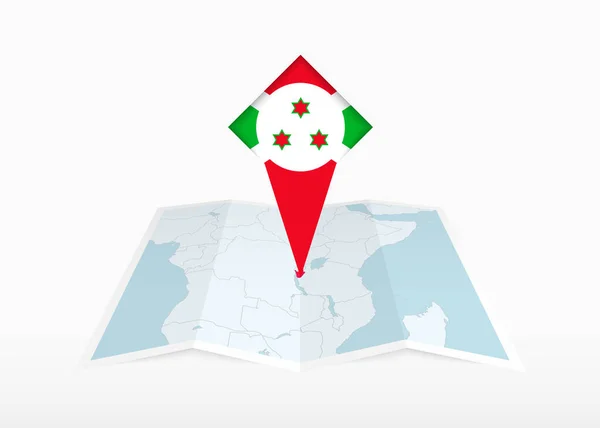 Burundi Katlanmış Bir Kağıt Haritada Resmedilmiş Burundi Bayrağı Ile Işaretlenmiş — Stok Vektör