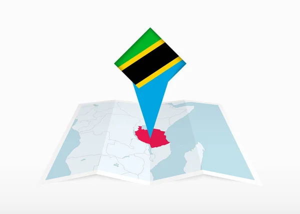 Τανζανία Απεικονίζεται Διπλωμένο Χάρτη Και Καρφιτσωμένο Δείκτη Θέση Σημαία Της — Διανυσματικό Αρχείο