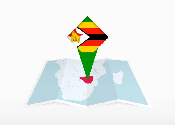 Zimbabwe Avbildas Vikbar Papperskarta Och Markerad Plats Med Zimbabwes Flagga — Stock vektor