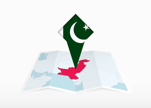 Пакистан Изображен Сложенной Бумажной Карте Приколотой Метке Местоположения Флагом Пакистана — стоковый вектор