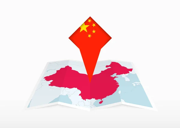 中国は折り畳まれた紙の地図上に描かれ 中国の旗を持つ固定位置マーカー — ストックベクタ