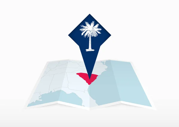 Южная Каролина Изображена Сложенной Бумажной Карте Приколотой Метке Местоположения Флагом — стоковый вектор