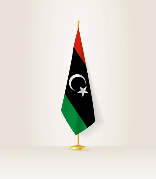 Líbia Lobogója Zászlóállványon — Stock Vector