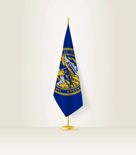 Nebraska Zászló Egy Zászlóállványon — Stock Vector
