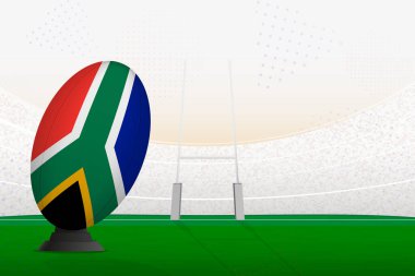 Güney Afrika milli takımının rugby topu ragbi stadyumu ve kale direkleri üzerinde penaltı ya da serbest vuruşa hazırlanıyor..