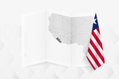 Bir tarafında Liberya bayrağı asılı gri tonlu bir Liberya haritası. Pek çok haber türü için vektör haritası.