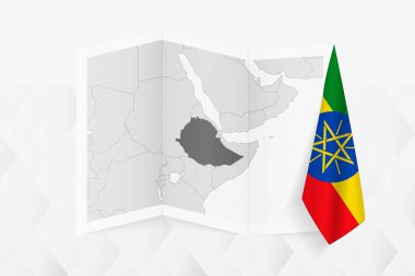 Etiyopya 'nın gri tonlarında bir haritası. Bir tarafında Etiyopya bayrağı asılı. Pek çok haber türü için vektör haritası.