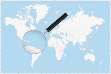 Bir dünya haritasında Antigua ve Barbuda haritasını gösteren büyüteç.