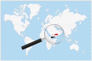 Dünya haritasında Yemen 'in haritasını gösteren büyüteç.