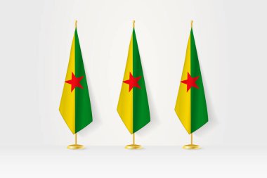 Altın bir stantta üç Fransız Guyanası bayrağı, basın toplantısı ve diğer toplantıların resimleri..