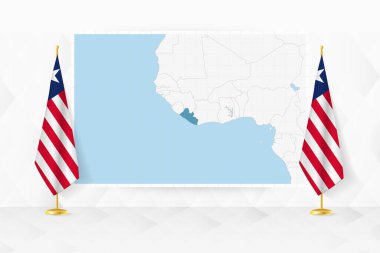 Liberya haritası ve bayrak standında Liberya bayrakları.