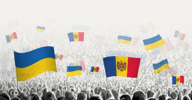 Moldova ve Ukrayna 'nın bayrağını sallayan insanlar, Moldova' nın Ukrayna için dayanışmasını simgeliyor.