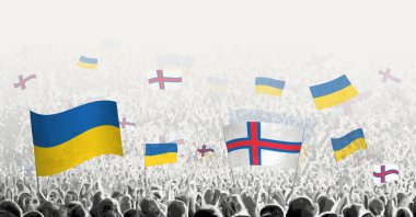 People waving flag of Faroe Islands and Ukraine, symbolizing Faroe Islands solidarity for Ukraine. clipart