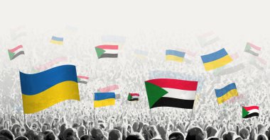 Sudan ve Ukrayna 'nın bayrağını sallayan insanlar, Sudan' ın Ukrayna için dayanışmasını sembolize ediyor..