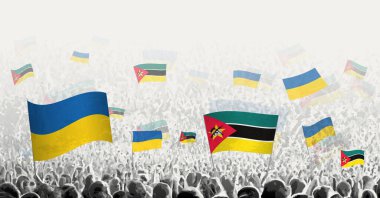 Mozambik ve Ukrayna 'nın bayrağını sallayan insanlar, Ukrayna' nın Mozambik dayanışmasını simgeliyor..