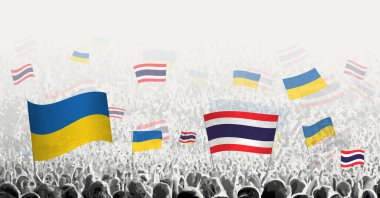 Tayland ve Ukrayna 'nın bayrağını sallayan insanlar, Ukrayna için Tayland dayanışmasını sembolize ediyor..