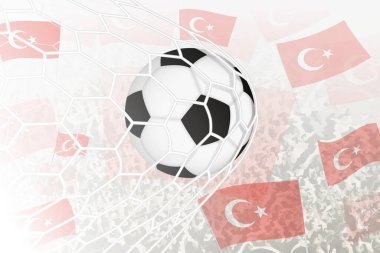 Türkiye Milli Futbol Takımı gol attı. Top kale ağındayken, futbol taraftarları arka planda Türkiye bayrağını sallıyor.