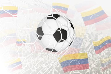 National Football team of Venezuela scored goal. Ball in goal net, while football supporters are waving the Venezuela flag in the background. clipart