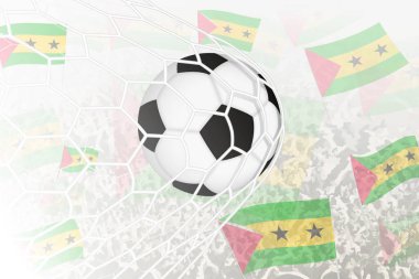 Sao Tome ve Principe Millî Futbol Takımı gol attı. Top kale ağındayken, futbol taraftarları arka planda Sao Tome ve Principe bayrağını sallıyor..