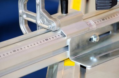 Close-up detail of a woodworking machine.