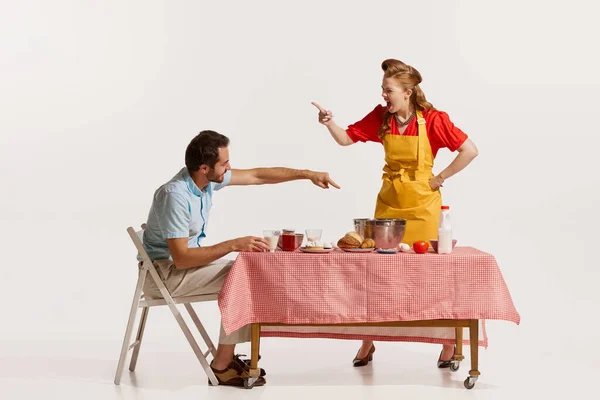 Portrait Young Emotive Couple Quarreling While Breakfast Isolated White Background — Stock Photo, Image
