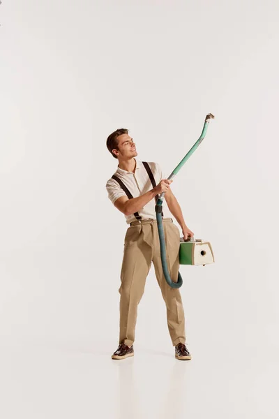 Portrait Handsome Stylish Young Man Posing Vintage Vacuum Cleaner Isolated — Stock Photo, Image