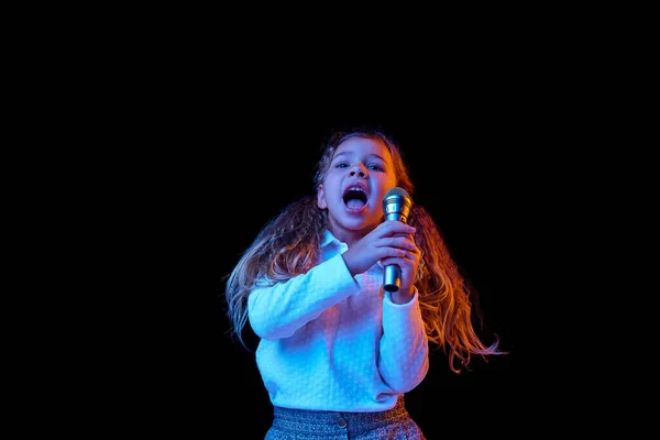 Singing Microphone Emotional Cute Little Girl Kid Posing Isolated Dark — Stock Photo, Image