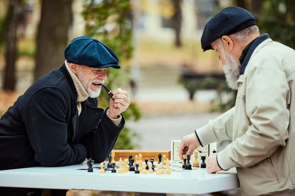 Portrait Two Senior Men Playing Chess Park Daytime Fall Game — Stock Photo, Image