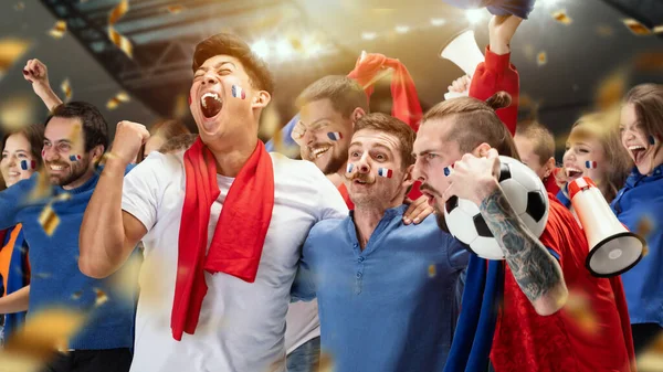 Win, goal. Group of happy thrilled excited football fans cheering for French soccer team victory. Concept of human emotions, global sports competitions, championship, ad.
