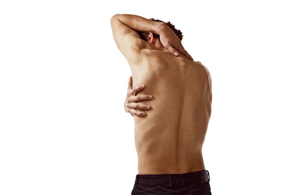 后视镜 年轻的无上衣男子 肌肉发达的身体隔离在白色背景 脊柱疼痛 男性美的概念 身体护理 广告的复制空间 — 图库照片