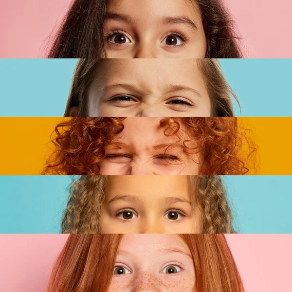 Collage. Eyes of cute girls, children placed in narrow horizontal stripes over multicolored background. Showing different emotions with look. Concept of emotions, childhood, facial expression.