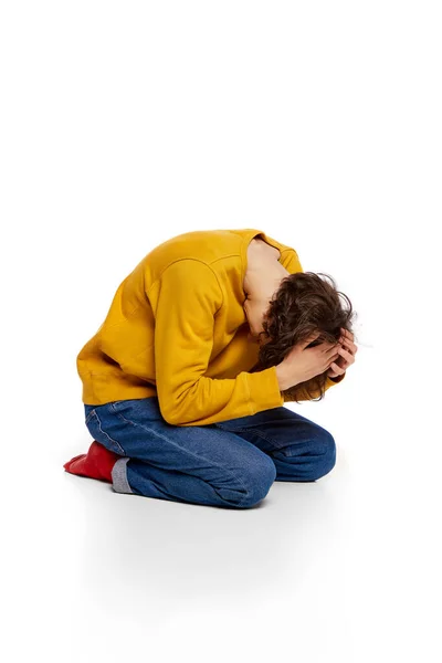 Portrait Young Boy Sitting Floor Suffering Mental Breakdown White Background — Stock Photo, Image