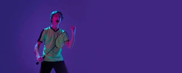 Portrait Teen Boy Uniform Badminton Player Successful Game Purple Background — Stockfoto