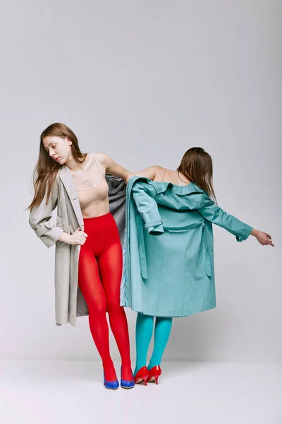 Portrait Two Young Girls Bright Red Blue Tights Coat Posing — Foto de Stock
