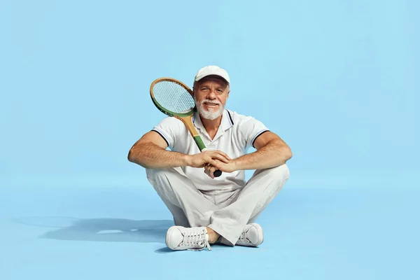 Delightful Portrait Handsome Senior Man Stylish White Outfit Sitting Posing — Zdjęcie stockowe