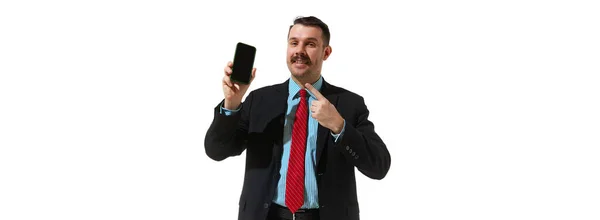 Businessman Suit Pointing Phone Screen Positivity White Studio Background Online — Fotografia de Stock