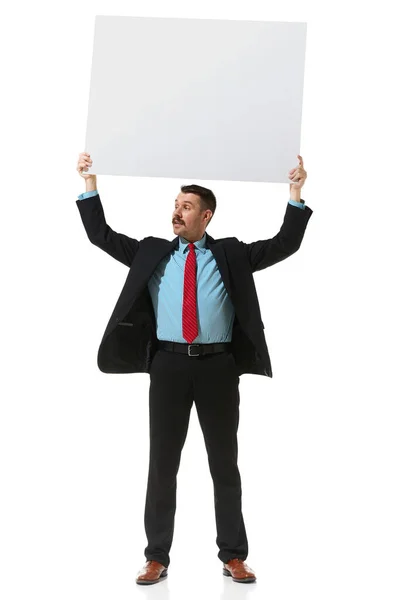 Businessman Suit Holding Big Empty Paper Text White Studio Background — Stock fotografie