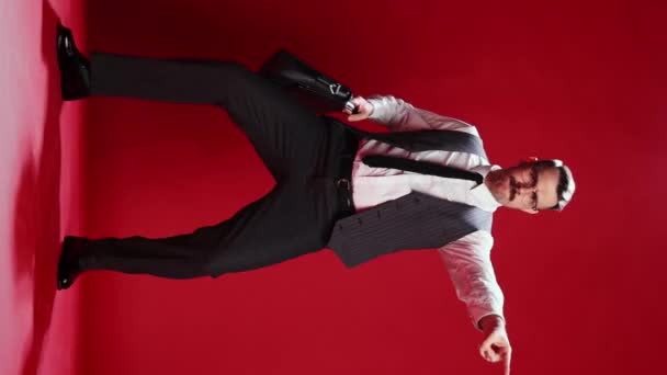 Handsome Businessman Official Classic Suit Dancing Posing Red Studio Background — Vídeo de Stock