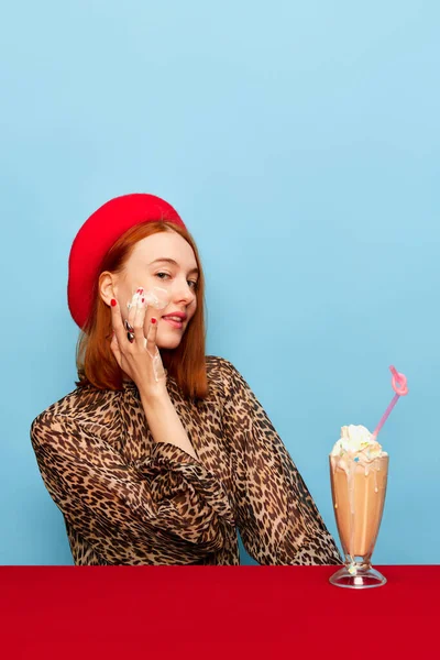 Applying Whipped Cream Face Young Woman Red Beret Milkshake Blue — Foto de Stock