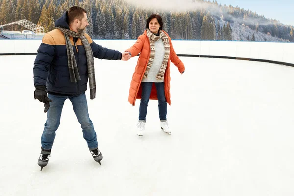 Mature Middle Aged Man Woman Couple Skating Open Air Ice — Stok fotoğraf