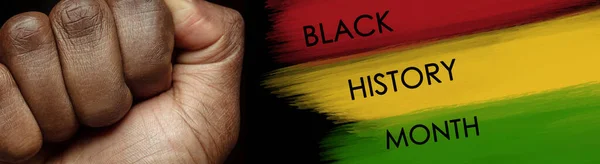 African-american culture. Racial equality. Male fist over red yellow green colors. No slavery. Black History Month. Banner, poster. Human rights, freedom, history, american culture